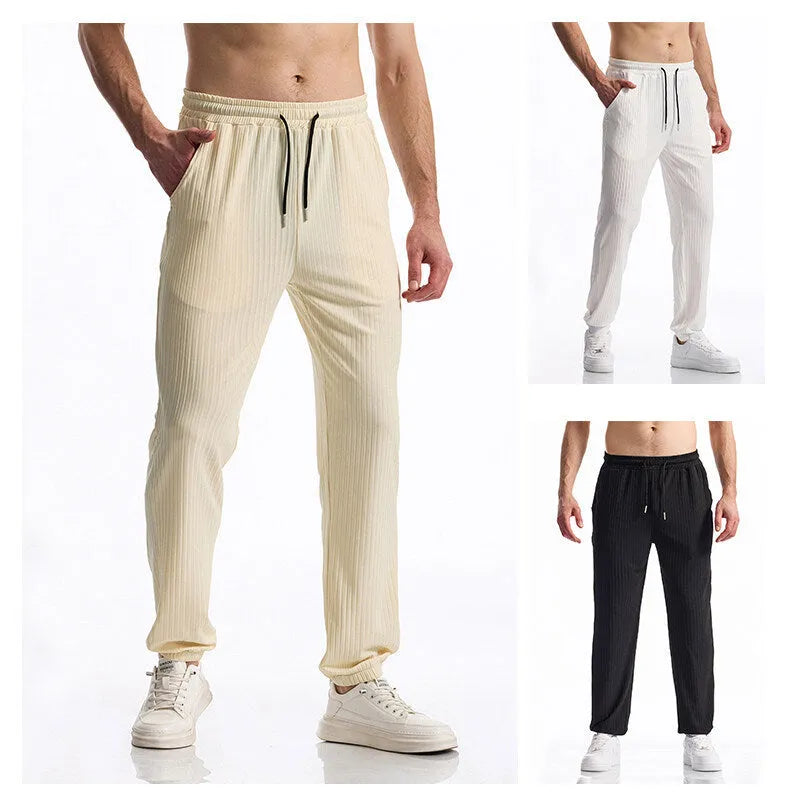 Silky rib fabric baggy straight trousers with drawstring waistband in black, white or khaki colours