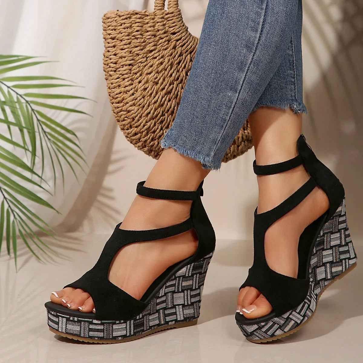 Women's thick-soled ankle-strap buckle sandals in cream white, showing cloth upper and rubber sole.
