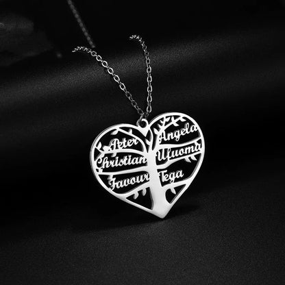 Custom stainless steel name necklace with hollow heart tree pendant in gold, rose gold, or silver on a chain.