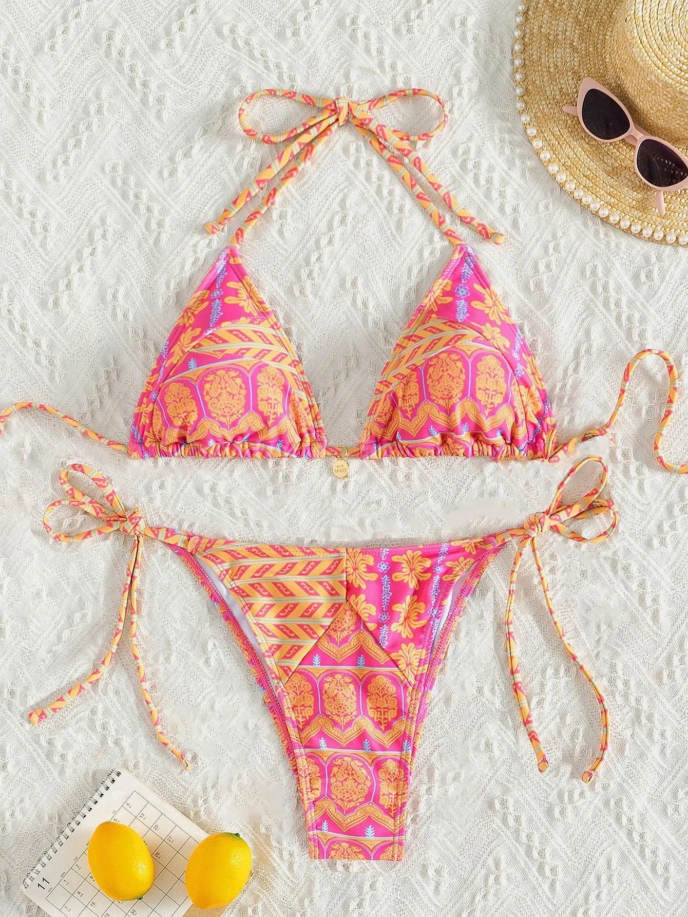 Women's bandage swimsuit with split bikini printing and stitching detail in polyester fabric