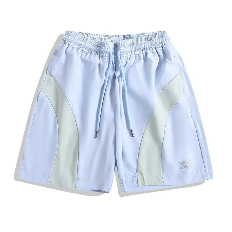 Men's black loose-fit quick-dry sports shorts with elastic waist, shown above the knee.