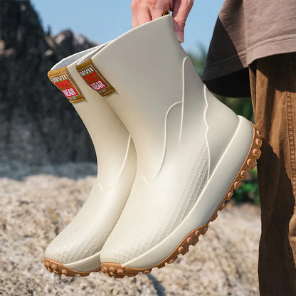 Men's mid low tube rain boots in black red colour with round toe and plastic soles