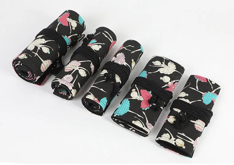 Canvas rolling pencil case with ballet girl print showing elastic loops for pencil storage