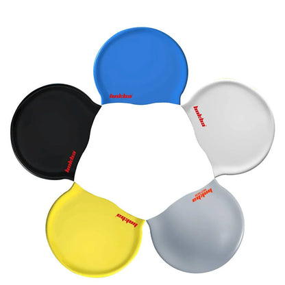 Coloured silicone adult swimming cap with letter pattern and built-in earmuff design.