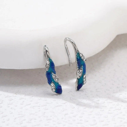 Bright blue feather earring and ring set in lightweight alloy with electroplated finish