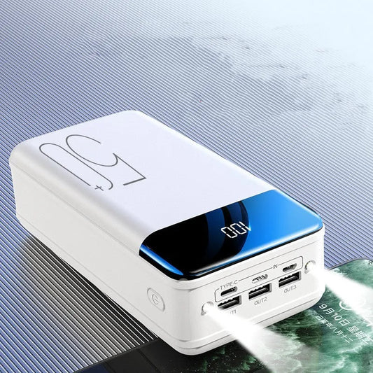 Black or white 50000mAh power bank with three USB output ports, measuring 169x83x52mm