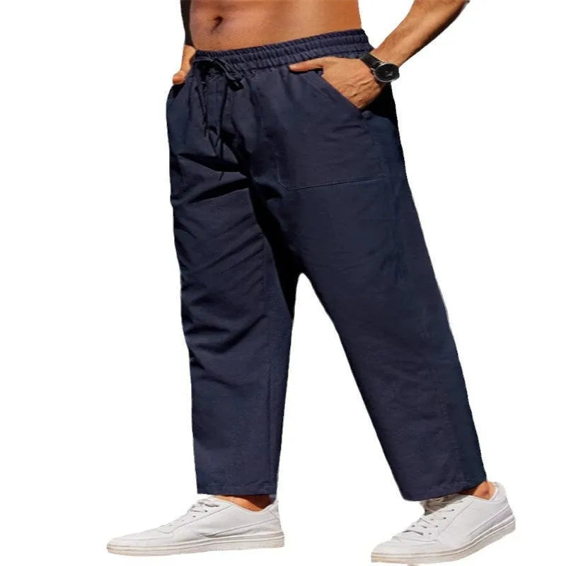 Men's straight-leg linen trousers in apricot colour with elastic waistband