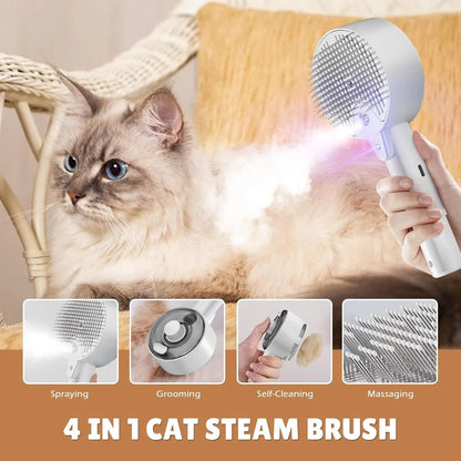 Pink and white cat steam brush with mist spray function, rounded head, and stainless steel comb bristles.