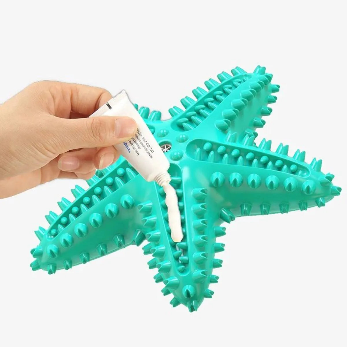 Blue edible TPR starfish dog chew toy with squeaker for large breeds.