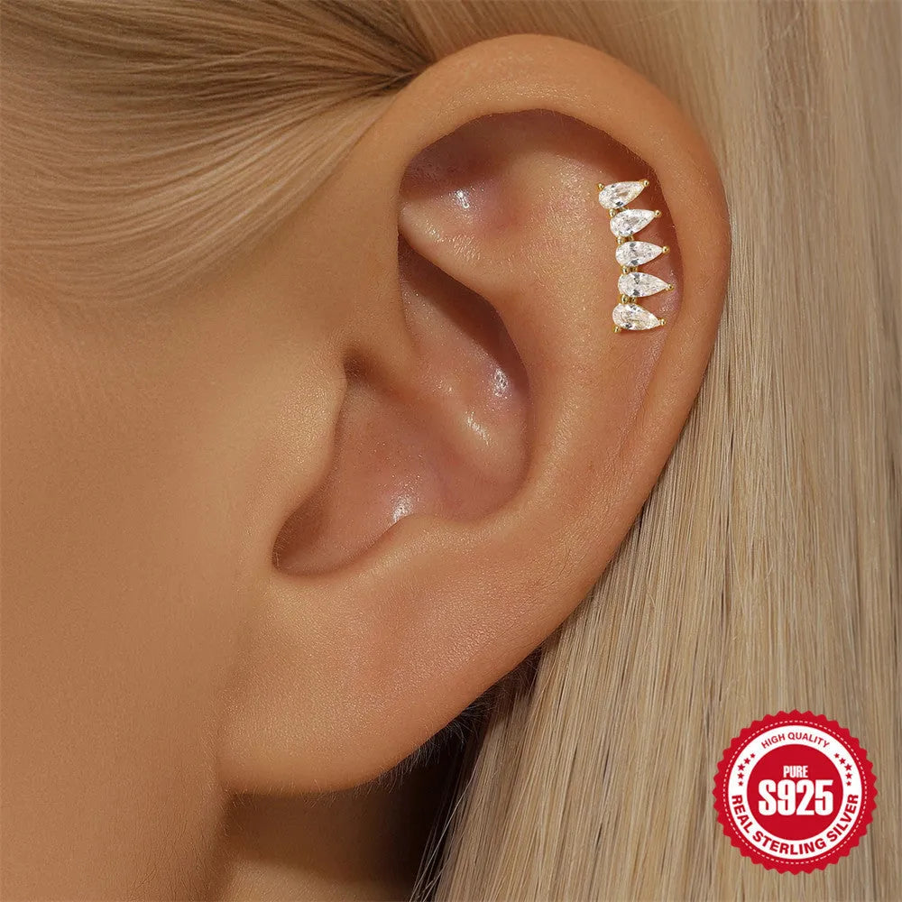 S925 sterling silver moon and star earrings with embedded diamond accents on a geometric design
