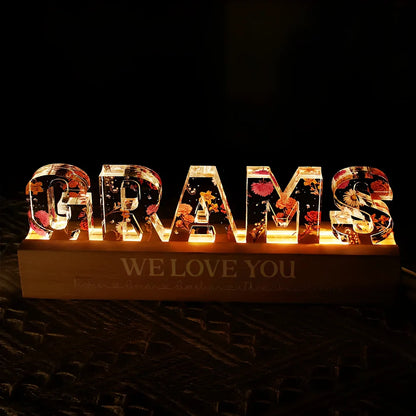 Custom flower printed LED night light with personalised text on acrylic surface in three size options