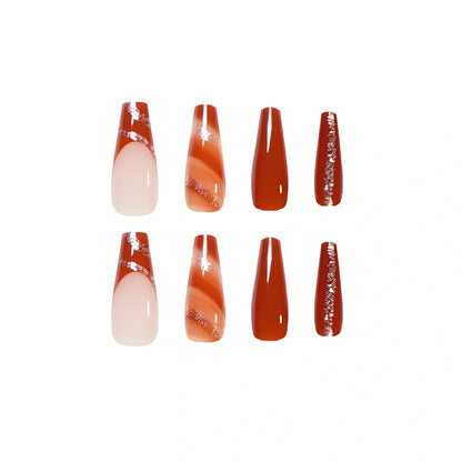 24 maple leaf red French tip press-on nails in open box showing long nail patch design