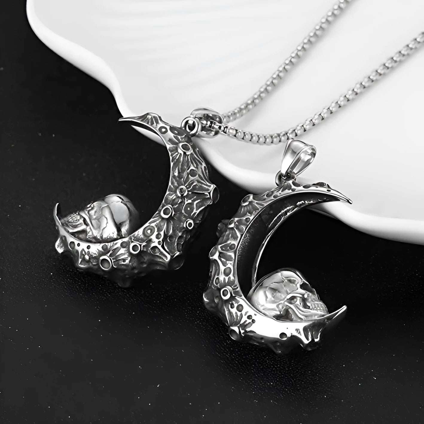 Men's silver stainless steel necklace with a detailed alloy skull pendant on a chain.