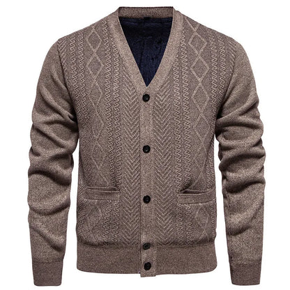 Man wearing a striped brown cardigan sweater with long sleeves and wool lining.