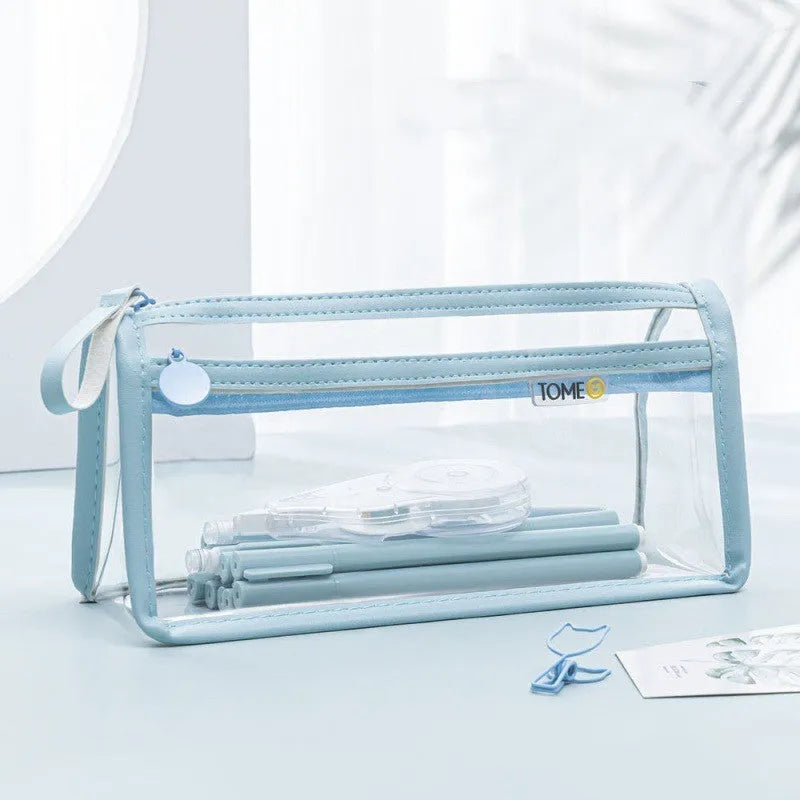 Transparent double-layer pencil case in blue showing organised stationery inside compartments
