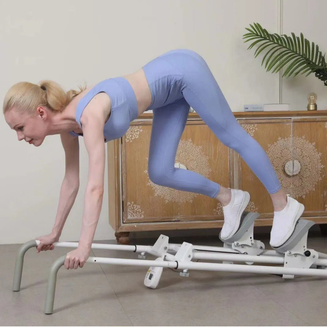White foldable treadmill with integrated climbing frame for home fitness, showing compact storage design