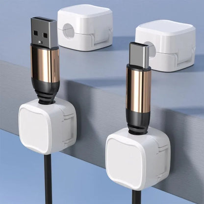 Black and white magnetic cable clips for under desk cable management with adhesive backing