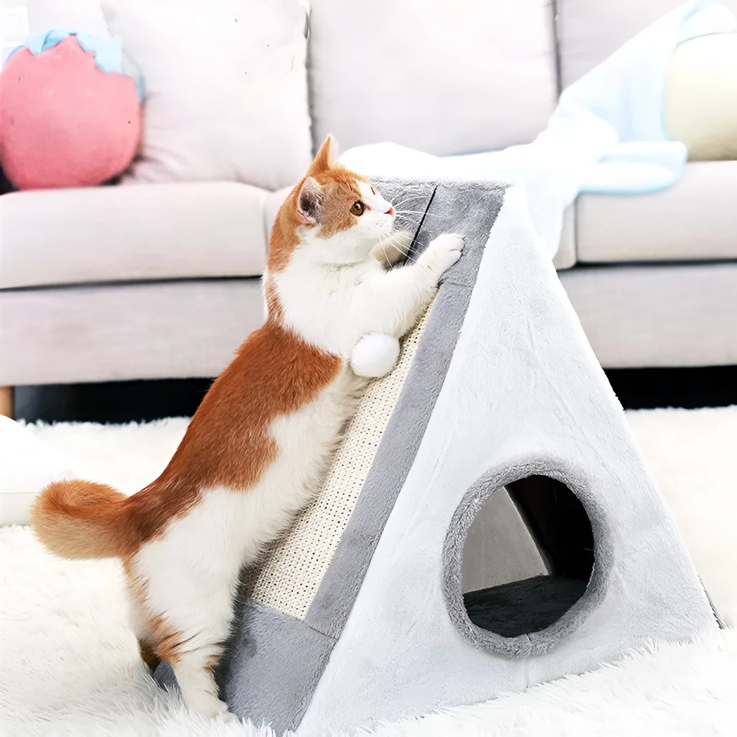 Grey and white triangular cat bed with an integrated sisal rope scratching post.