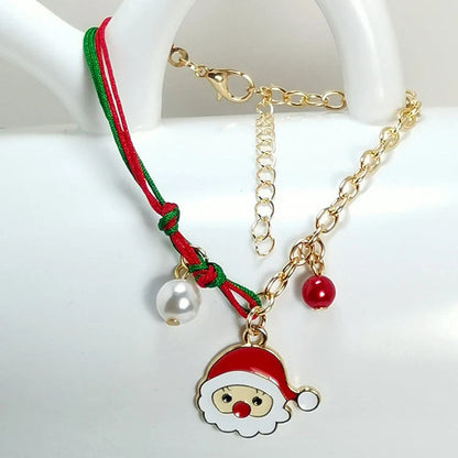 Charming Christmas bracelet with festive charms like Santa, snowmen, and snowflakes