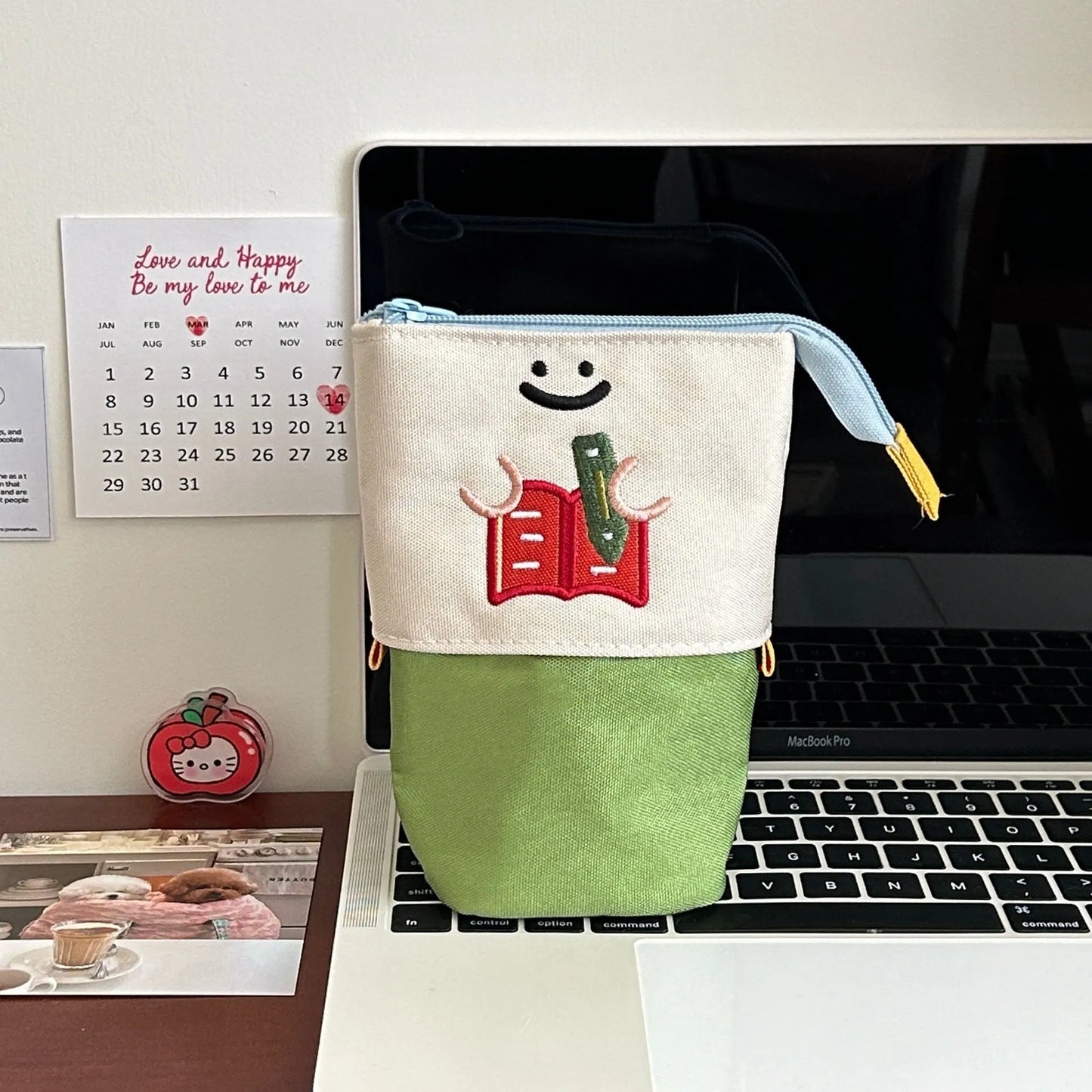 Brown and green cartoon collapsible pencil case measuring 17x14cm with Oxford fabric construction