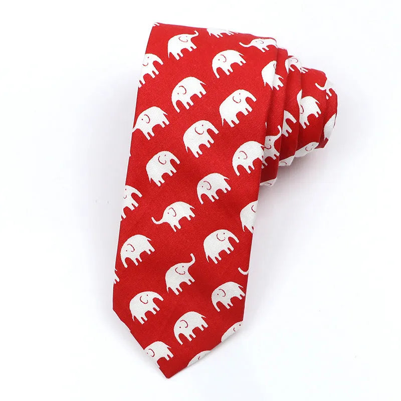 A narrow Korean-style cotton bow tie featuring a cartoon print, shown in a selection of colours.