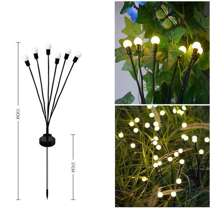 Solar-powered ground plug lawn light with automatic dusk-to-dawn operation and multiple head configurations