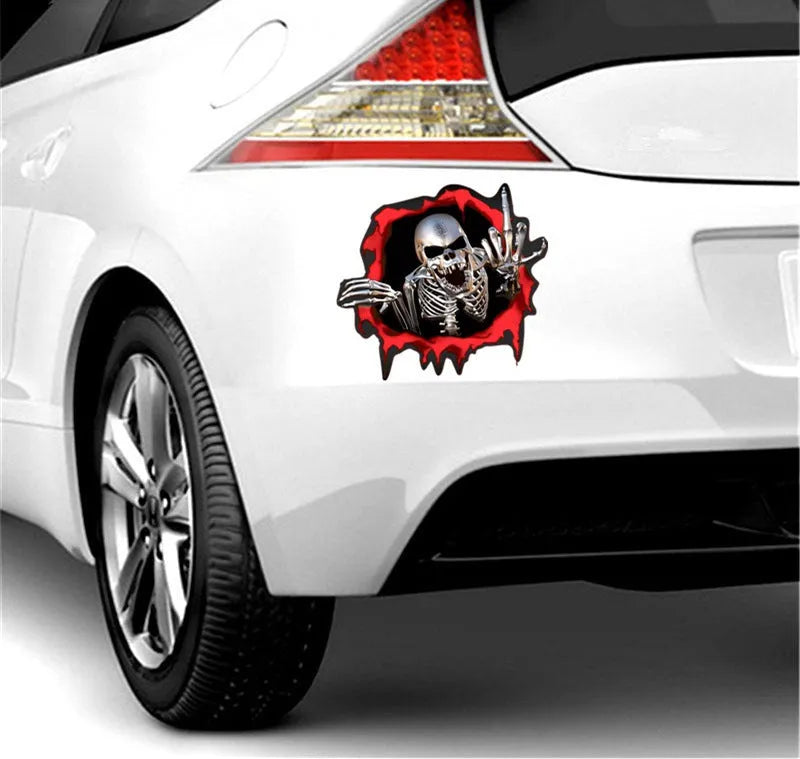 Reflective metal skull bumper sticker with colourful broken shell design on white background