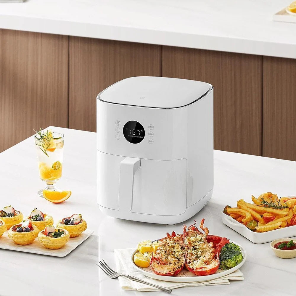 White 4.5L air fryer with baking tray, 1200W power for healthier cooking with less oil