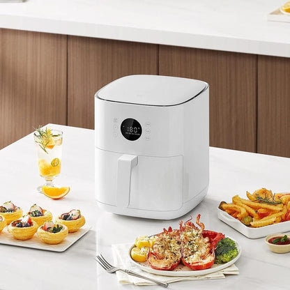 White 4.5L air fryer with baking tray, 1200W power for healthier cooking with less oil