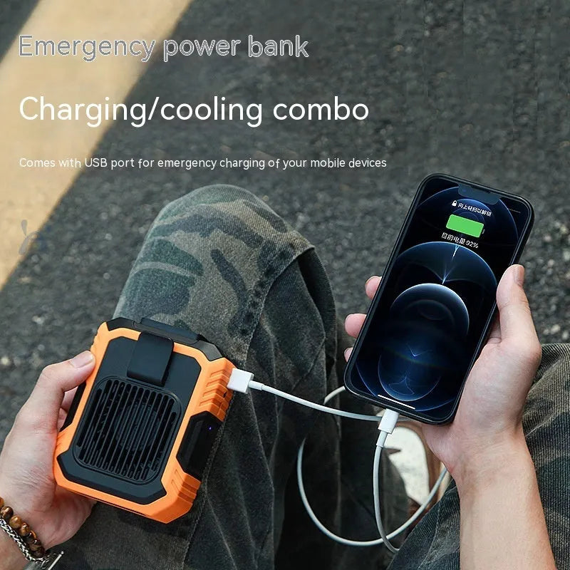 Green wrist hanging fan with light and USB power bank on a person's arm, showing three speed buttons.