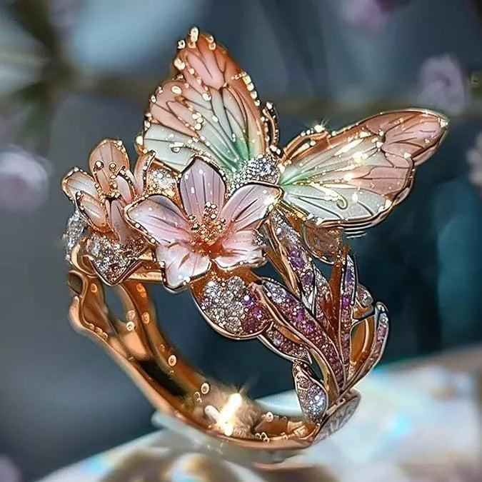 Adjustable crystal butterfly flower ring in gold, silver, and rose gold finishes