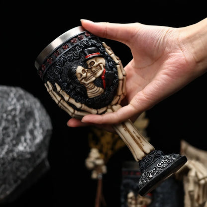 Stainless steel wine goblet with red skeleton design, 200ml capacity.