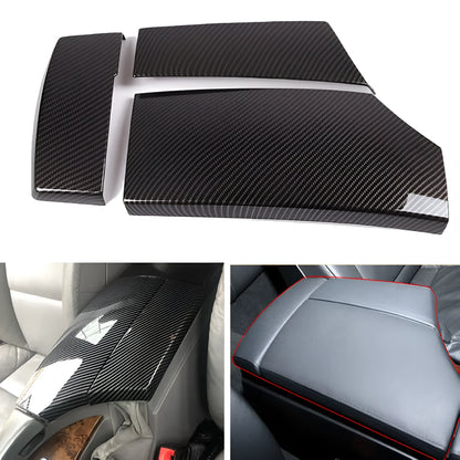 Set of three black ABS plastic armrest box covers with a shiny carbon fibre weave pattern.