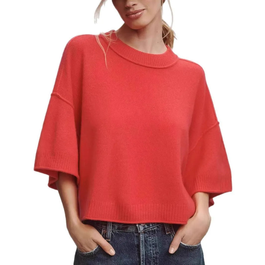 Red short viscose T-shirt with an exposed navel design on a mannequin.