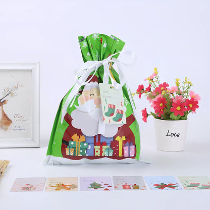 Christmas gift bag with drawstring closure in laser gold finish, 32x24cm dimensions