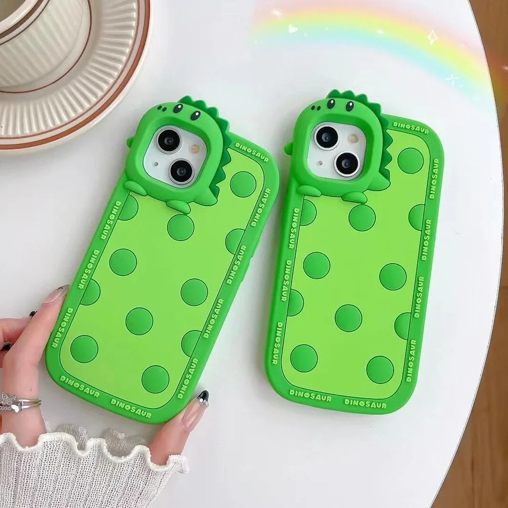 Green polka dot dinosaur silicone phone case showing back design and side protection for iPhone