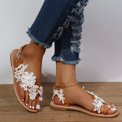 Bohemian lace sandals with floral ankle strap in white and black