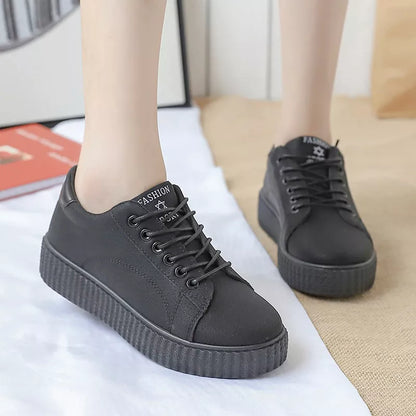Women's black and khaki thick sole sneakers for sports and casual wear