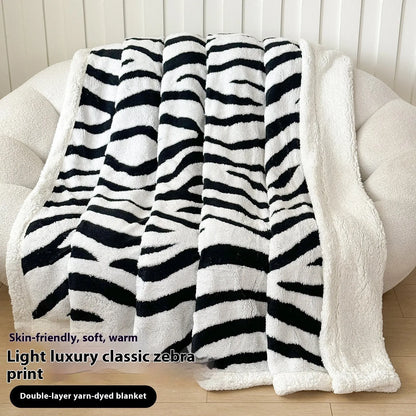 Double-layer cationic leopard jacquard taffeta blanket showing raised animal print pattern in available colour options