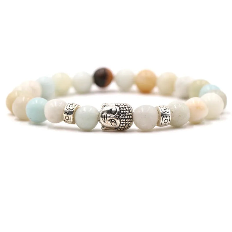 Stretch bracelet with natural stone beads for men and women, featuring an 8mm bead diameter and 19cm circumference, available in multiple stone colours including Tigereye, Amazon stone, turquoise, malachite, and volcanic rock.