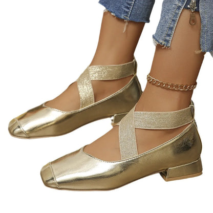 Women's gold slip-on square-toe evening pump with a low rubber heel, shown as a reusable overshoe.