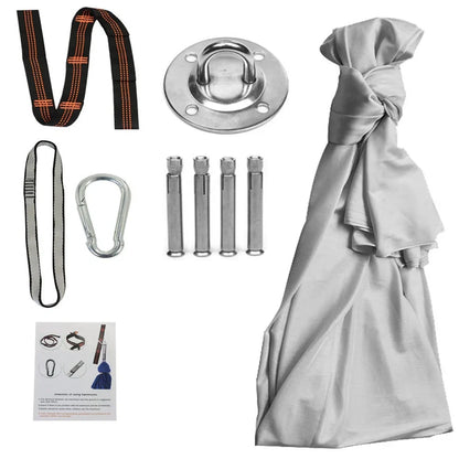 Child in black therapy swing cocoon with multi-loop daisy chain height adjustment system