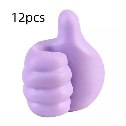 Silicone thumb wall hooks in various colors for organizing kitchen and bathroom items