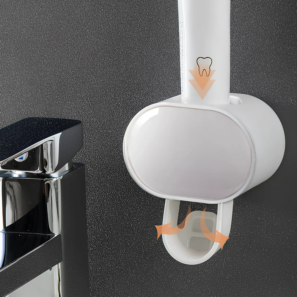 Black wall mounted automatic toothpaste dispenser with squeeze mechanism and dustproof toothbrush storage