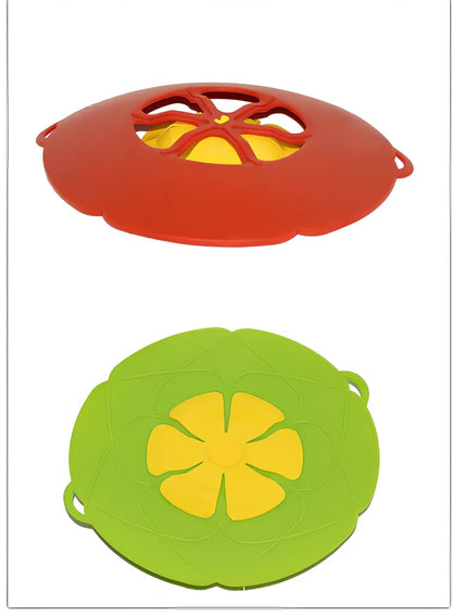 Green silicone spill stopper pan lid on cooking pot showing flexible edges and steam vent