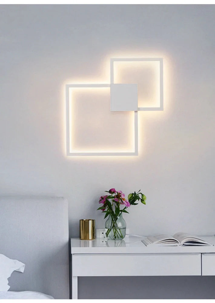 Square 35.3cm geometric LED wall light in white, iron frame with acrylic diffuser, 20W-24W output