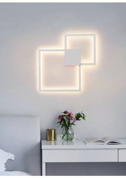 Square 35.3cm geometric LED wall light in white, iron frame with acrylic diffuser, 20W-24W output