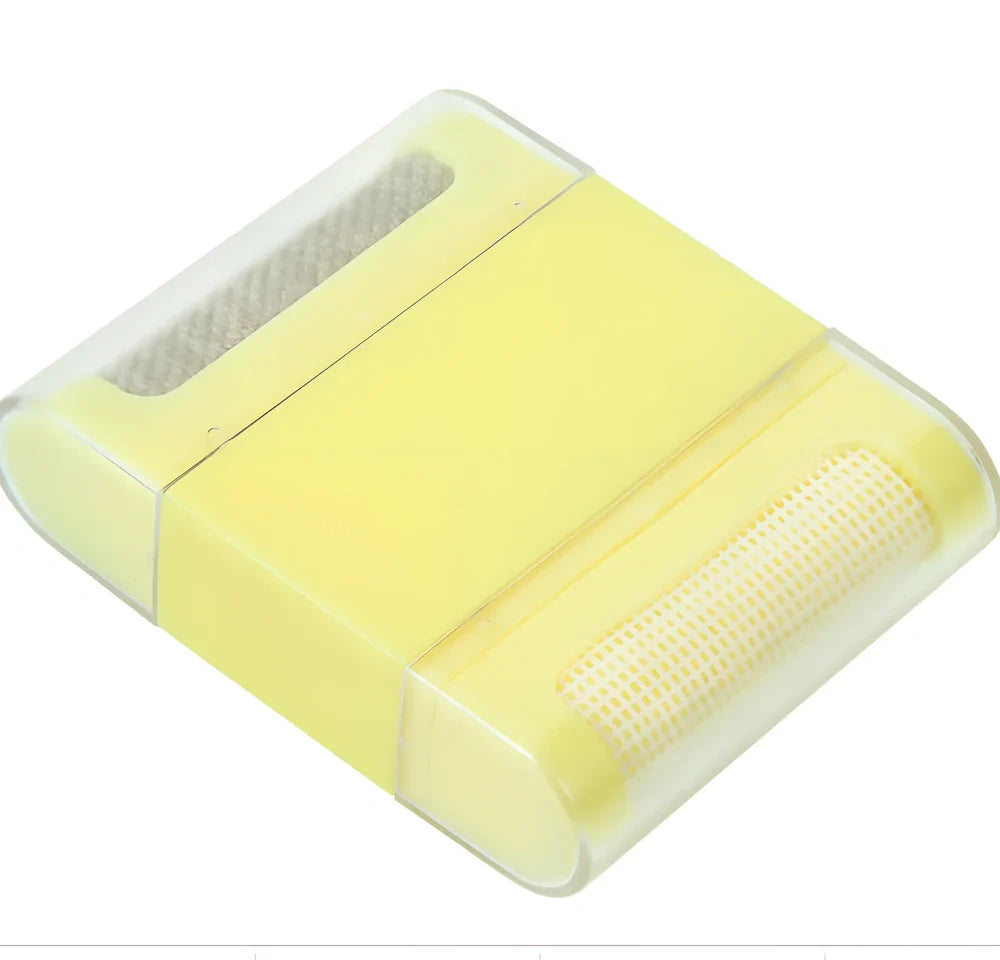 Portable manual fabric cleaning brush with removable catching net, 6.4 cm wide plastic construction