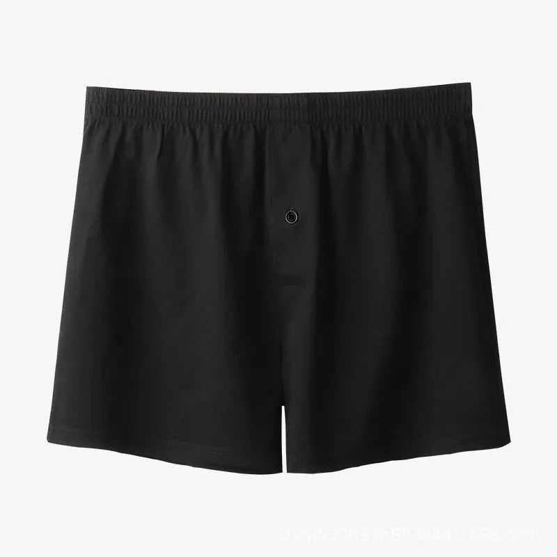 Men's cotton boxer shorts in black colour showing loose fit and high waist design