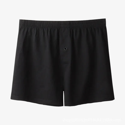 Men's cotton boxer shorts in black colour showing loose fit and high waist design